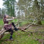Belen Prado from Enchanted Flute playing the flute outdoors-5